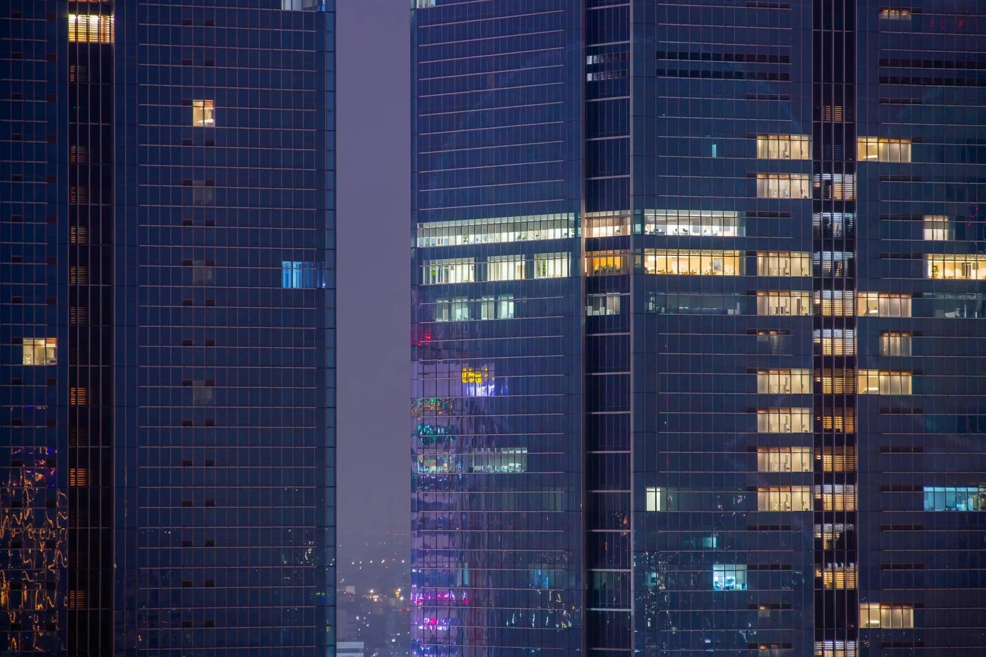 City towers lit at night